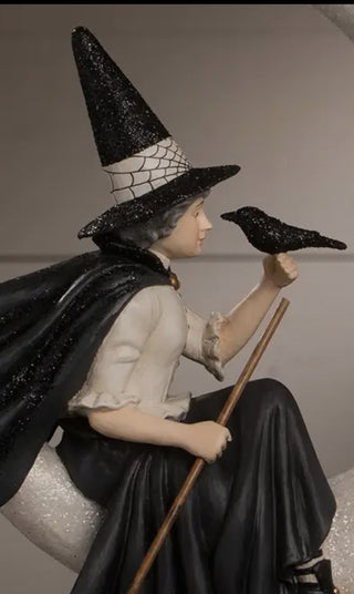 Bewitching Belle Upon a Crescent Moon