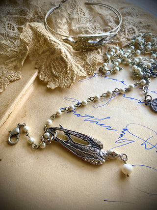French Swallow on Rosary Pearl Chain